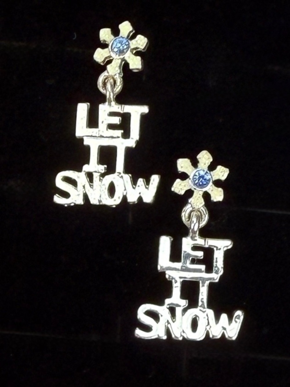 Silvertone “let it snow” Snowflake pierced post Earrings with Blue Accents